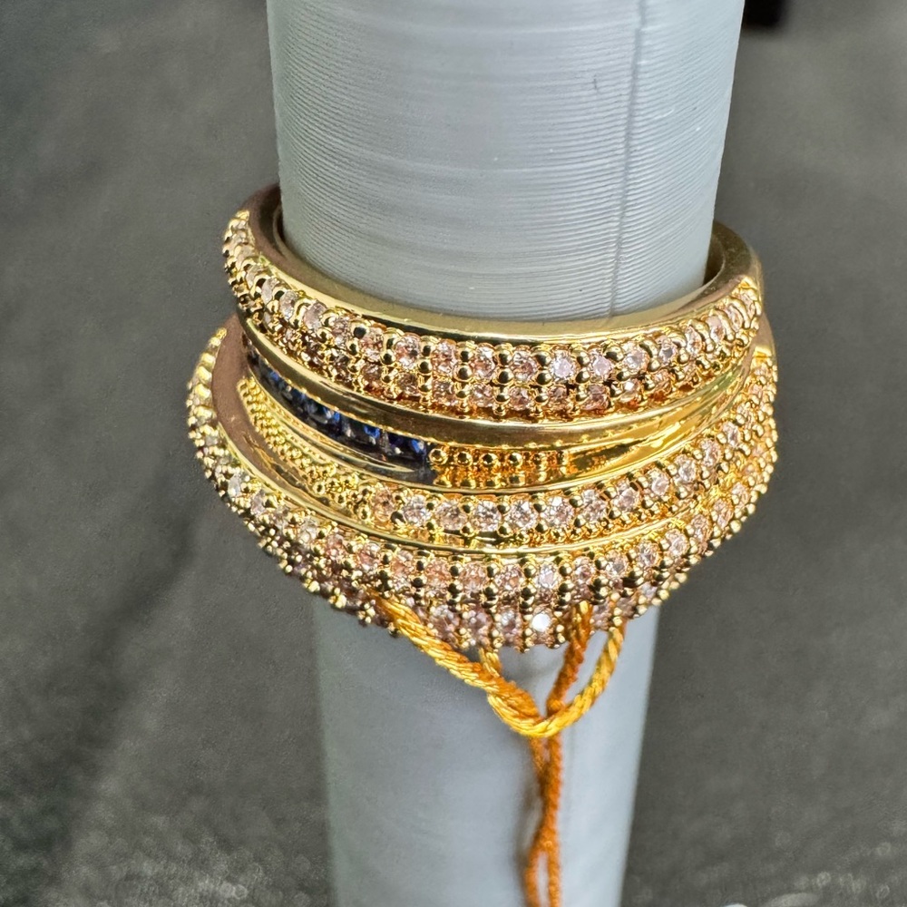 bran new with tage sz 7.5 adjustable Eye Candy gold ring